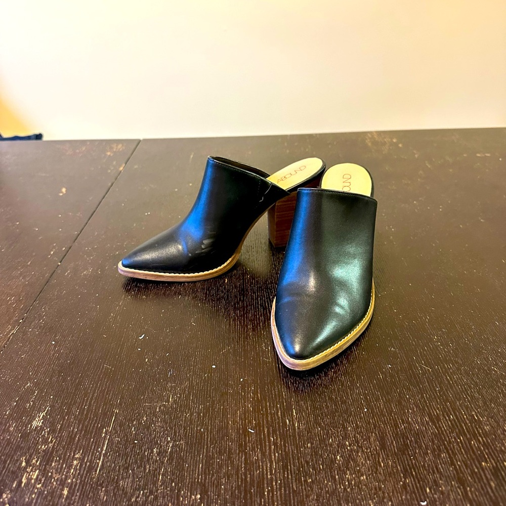 Women’s Black leather pointed toe high heel mule/boot. Size 7.